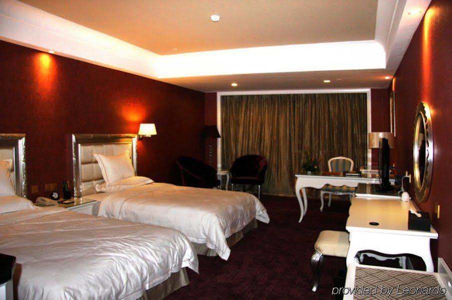 Taishan Junhaiyue Phoenix Hotel Стая снимка